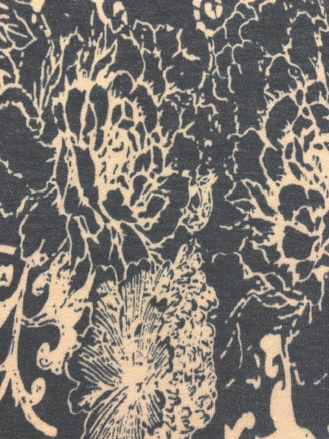Blue & Ivory Floral Jersey Fabric – Soft Stretch for Stylish Garments
