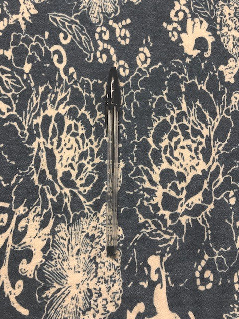 Blue & Ivory Floral Jersey Fabric – Soft Stretch for Stylish Garments