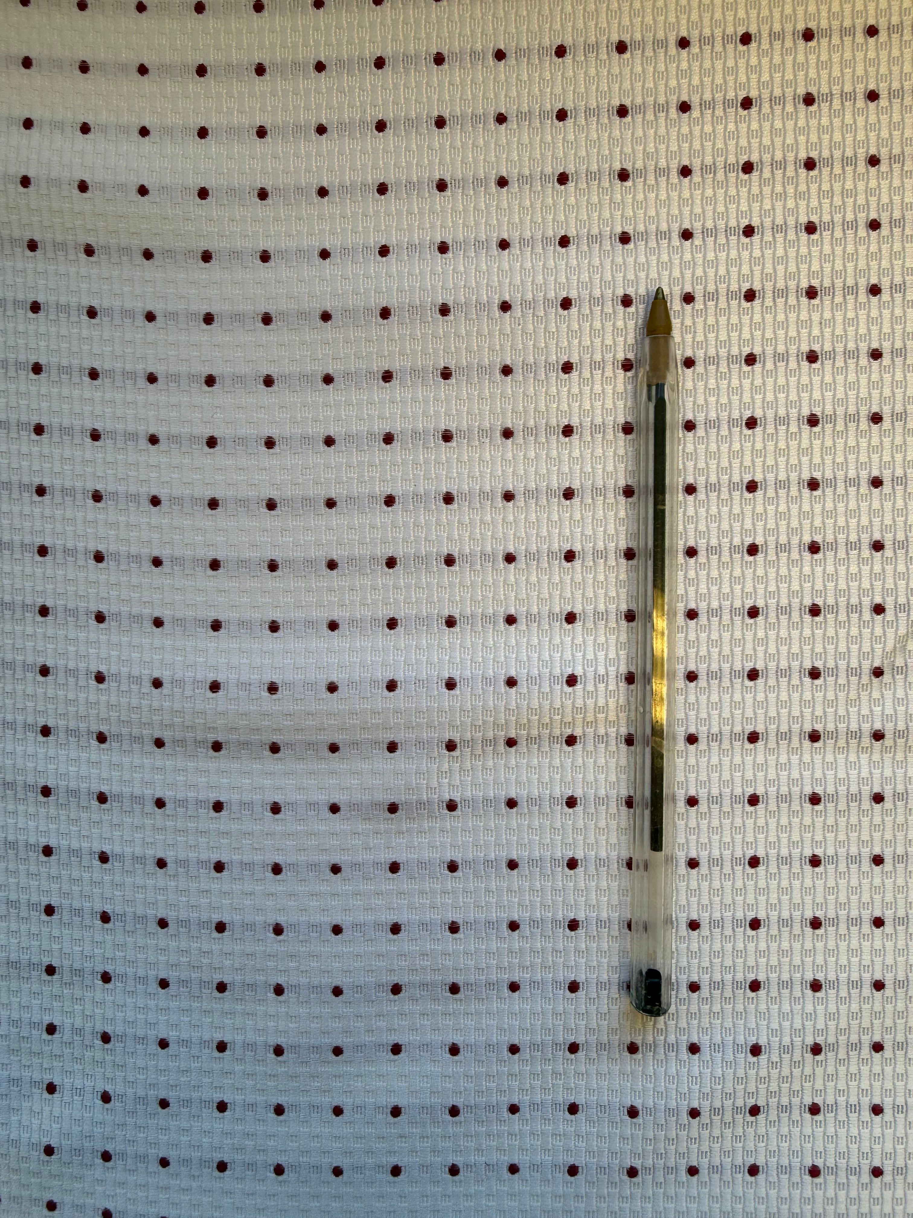 White Textured Woven Fabric with Burgundy Spots – 130 cm Wide