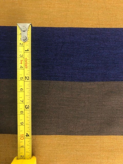 Dark Purple/Orange/Chocolate Broad Stripes. Stripes Run Across The Fabric