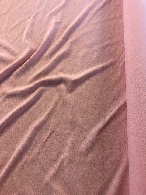 Pink Viscose/Poly Crepe With Stretch. 170g/m2, 51% Viscose 47% Polyester 2% Elastane. Roll Size: 3.3m