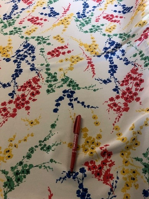 Multi Flower Bunches on Crepe de Chine. 110g/m2, 100% Polyester. Roll Size: 6.7m