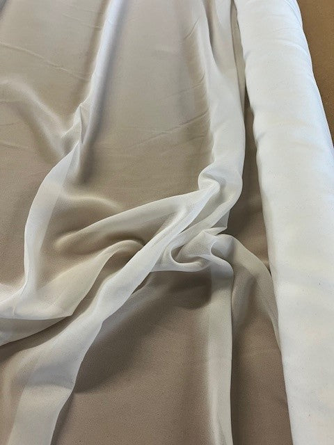 Ivory Blouse Weight, Silky Handle. 90g/m2, 100% Polyester. Roll Size: 8.8m