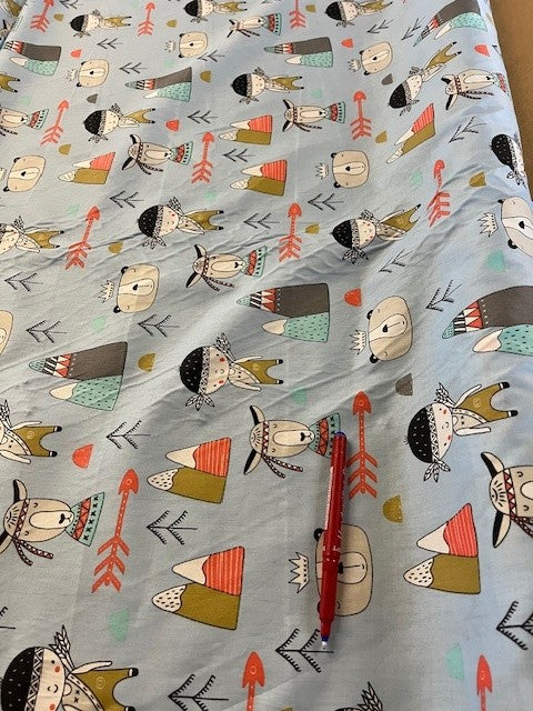 Indians on Sky Blue Cotton. 120g/m2, 100% Cotton. Roll Size: 1.6m