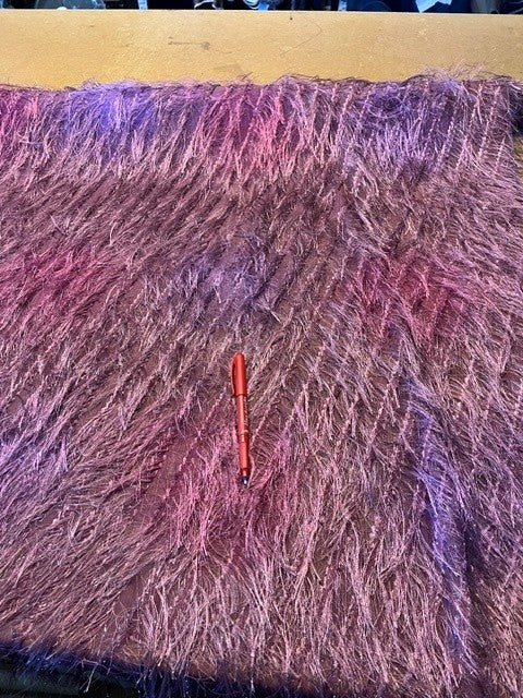 Mauve Diagonally Running Tassels With Over Print. 100% Polyester, 100g/m2, 114cm Wide. Roll Size: 4.4m