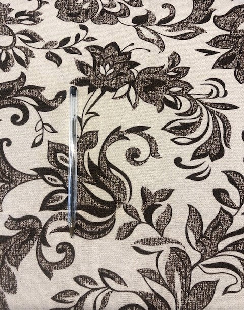 Brown Print On Ivory Morgan Crepe. 77% Viscose, 20% Nylon, 3% Elastane. Roll Size 4.4m