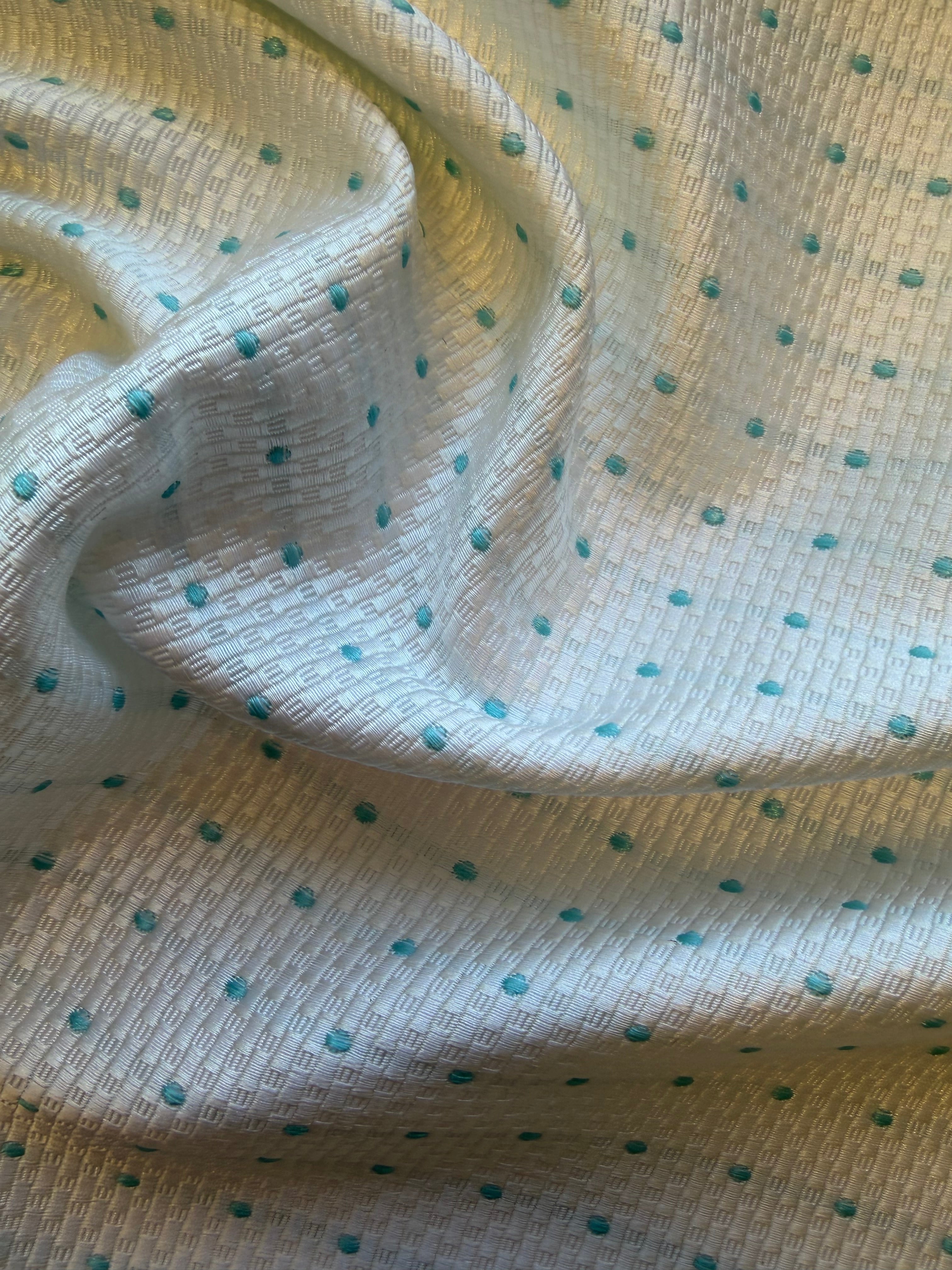 White Textured Woven Fabric with Aqua Spots – 130 cm Wide