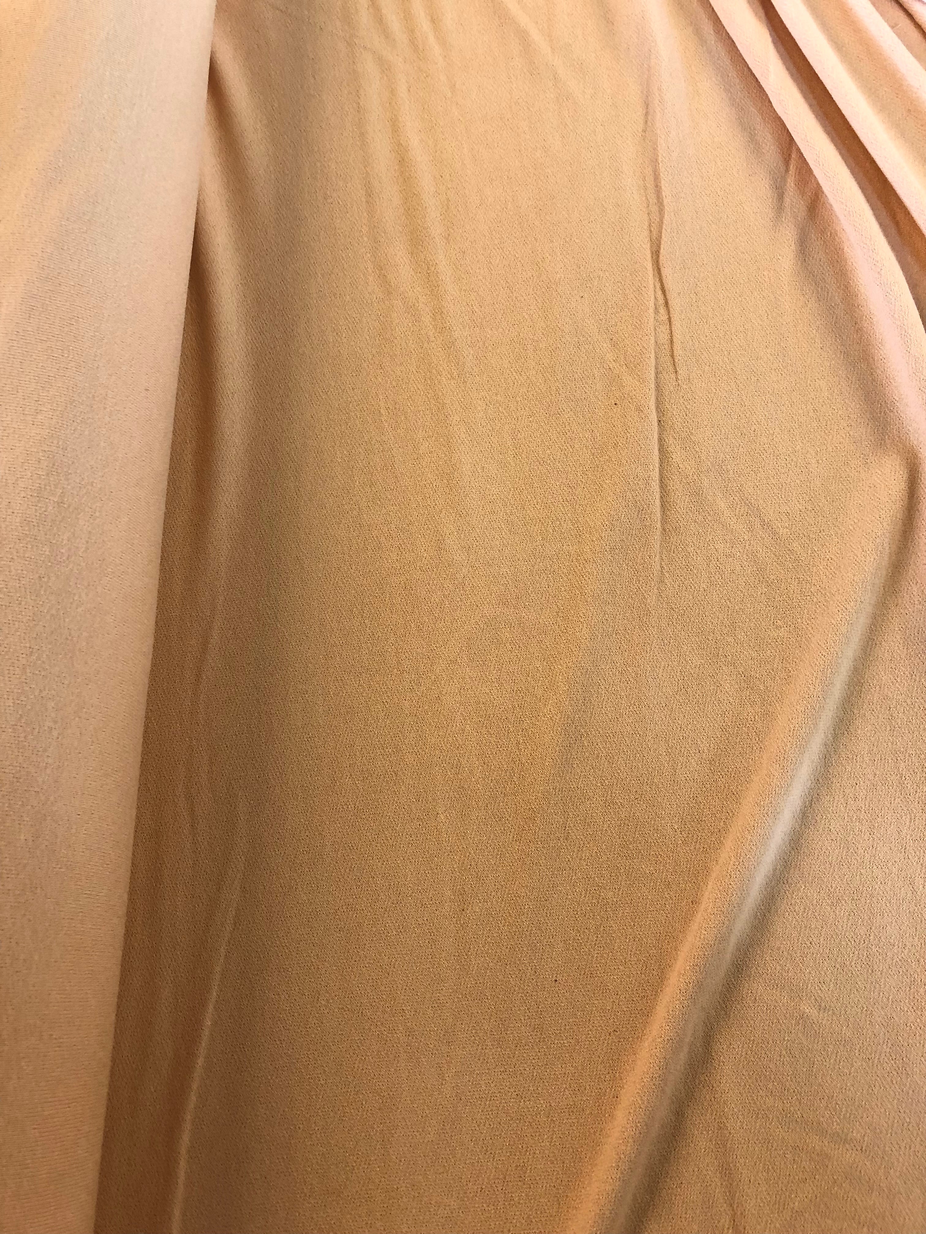 Light Apricot Crepe Jersey. 150g/m2, 95% Polyester 5% Elastane. Roll Size: 6.5m