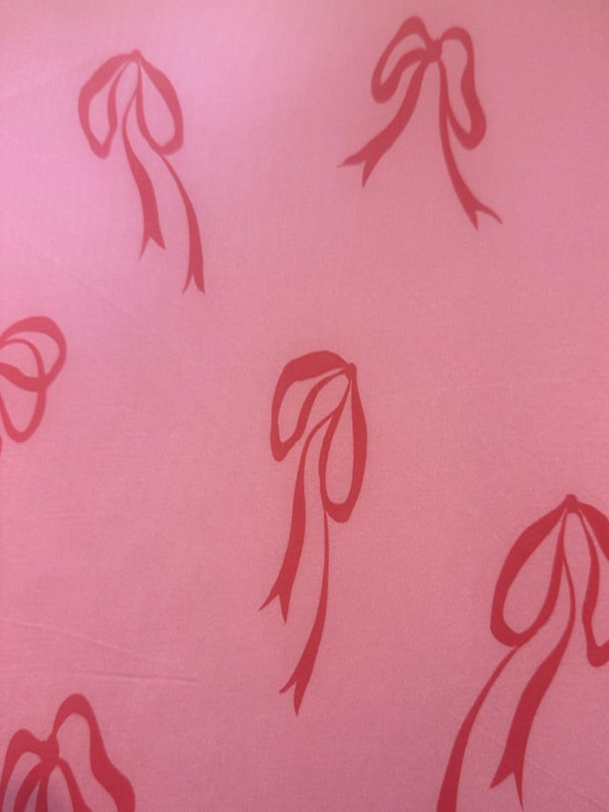 Red Bows on Bright Pink Satin Finish One Way Stretch Cotton