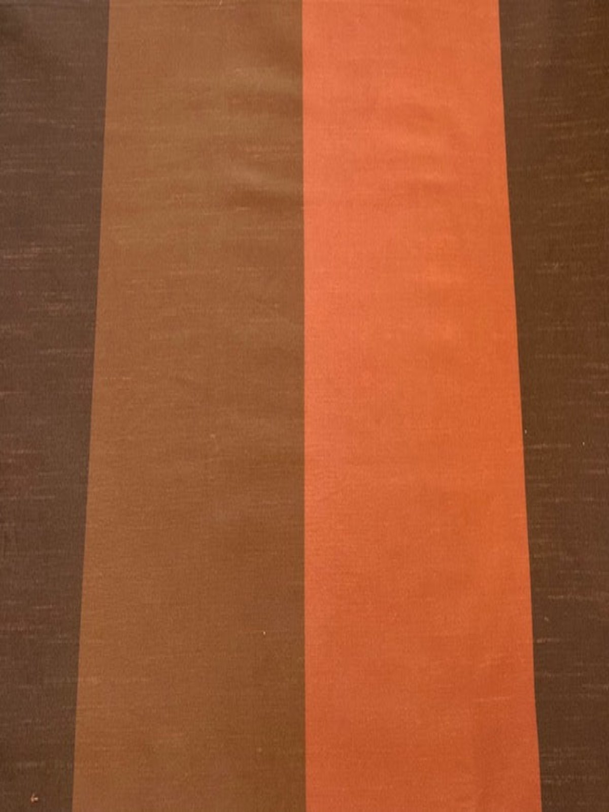 Brown/Brick Stripes on Dupion. Stripes run along the Fabric