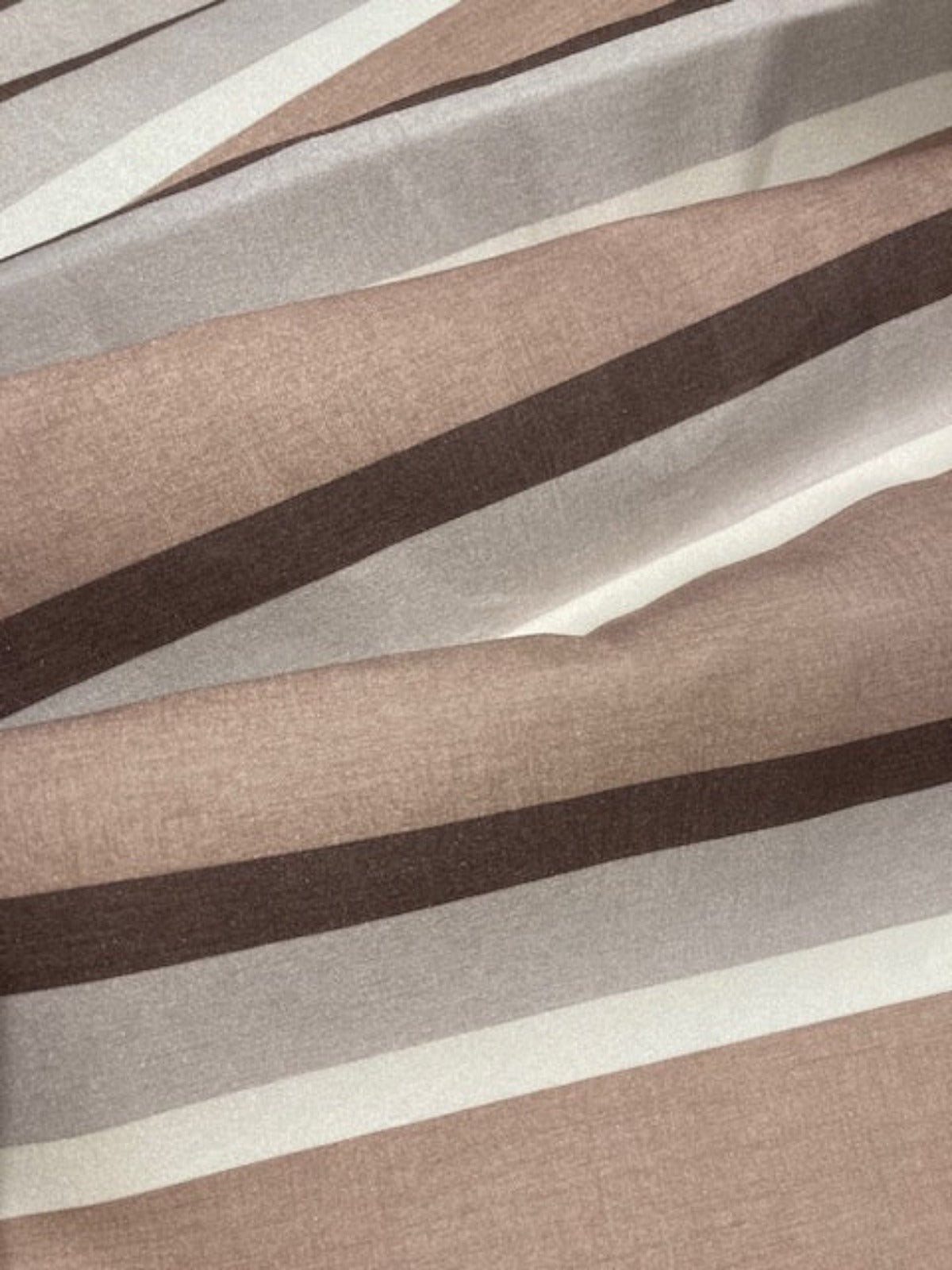 Coffee Tone Stripes. Stripes run along the fabric.