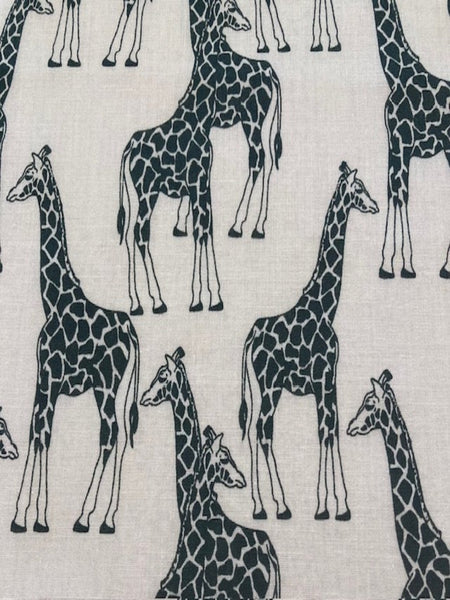 Giraffes on White Poly/Cotton