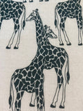 Giraffes on White Poly/Cotton