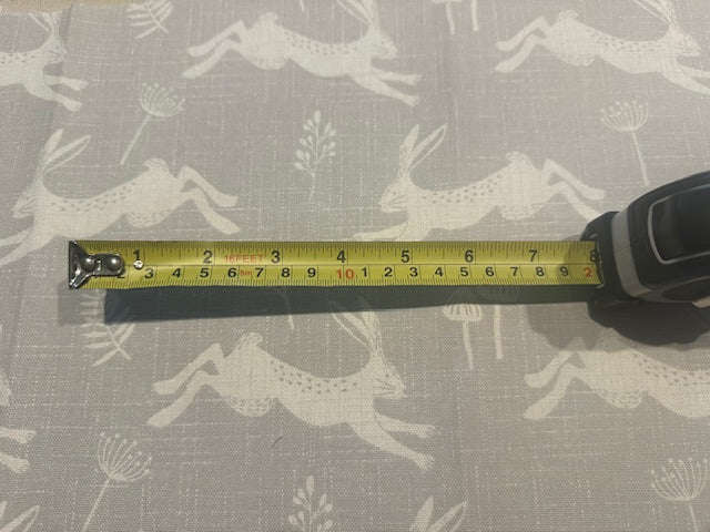 Ivory Running Hares on Pale Grey Furnishing