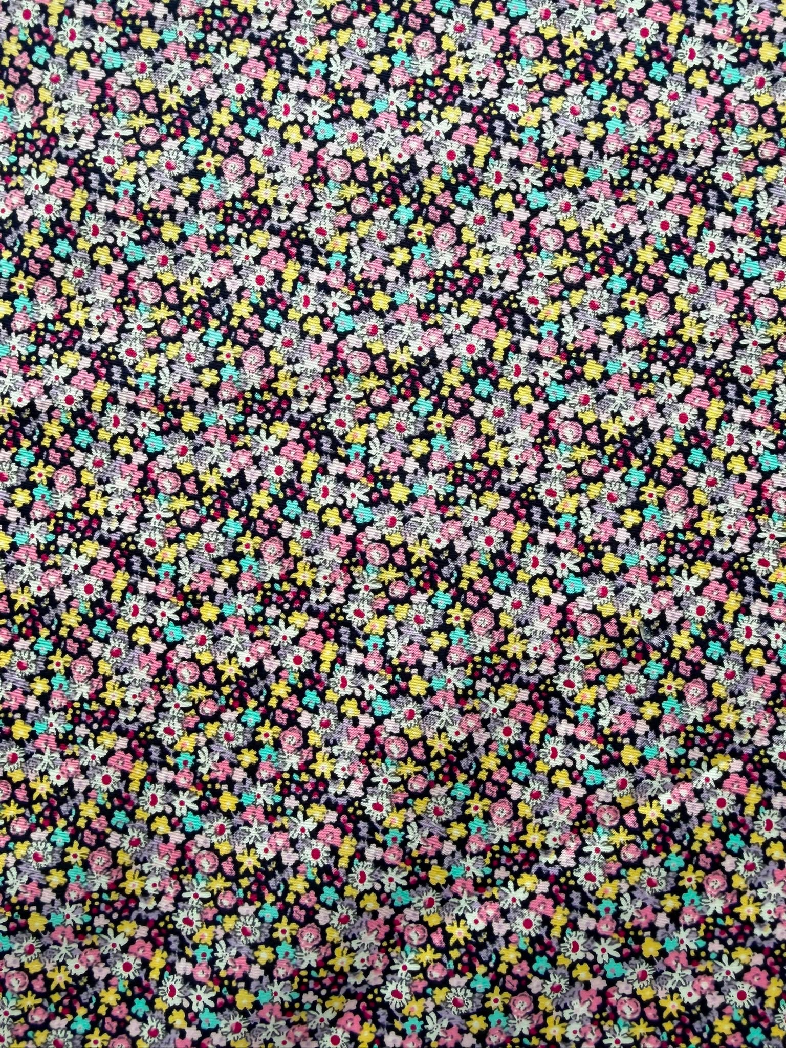 112cm Wide Multicoloured Ditzy Floral Cotton Fabric on Black – 100% Cotton