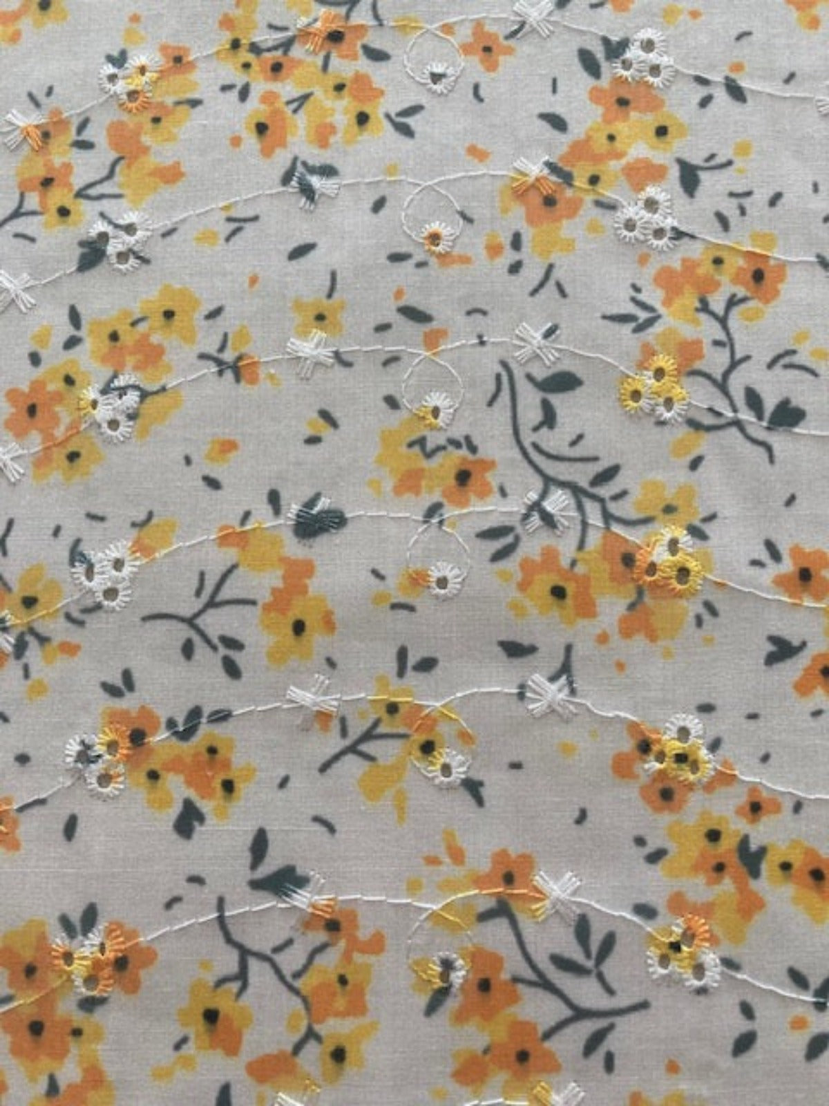 Orange Flower Bunches on Ivory Broderie Anglaise Fabric
