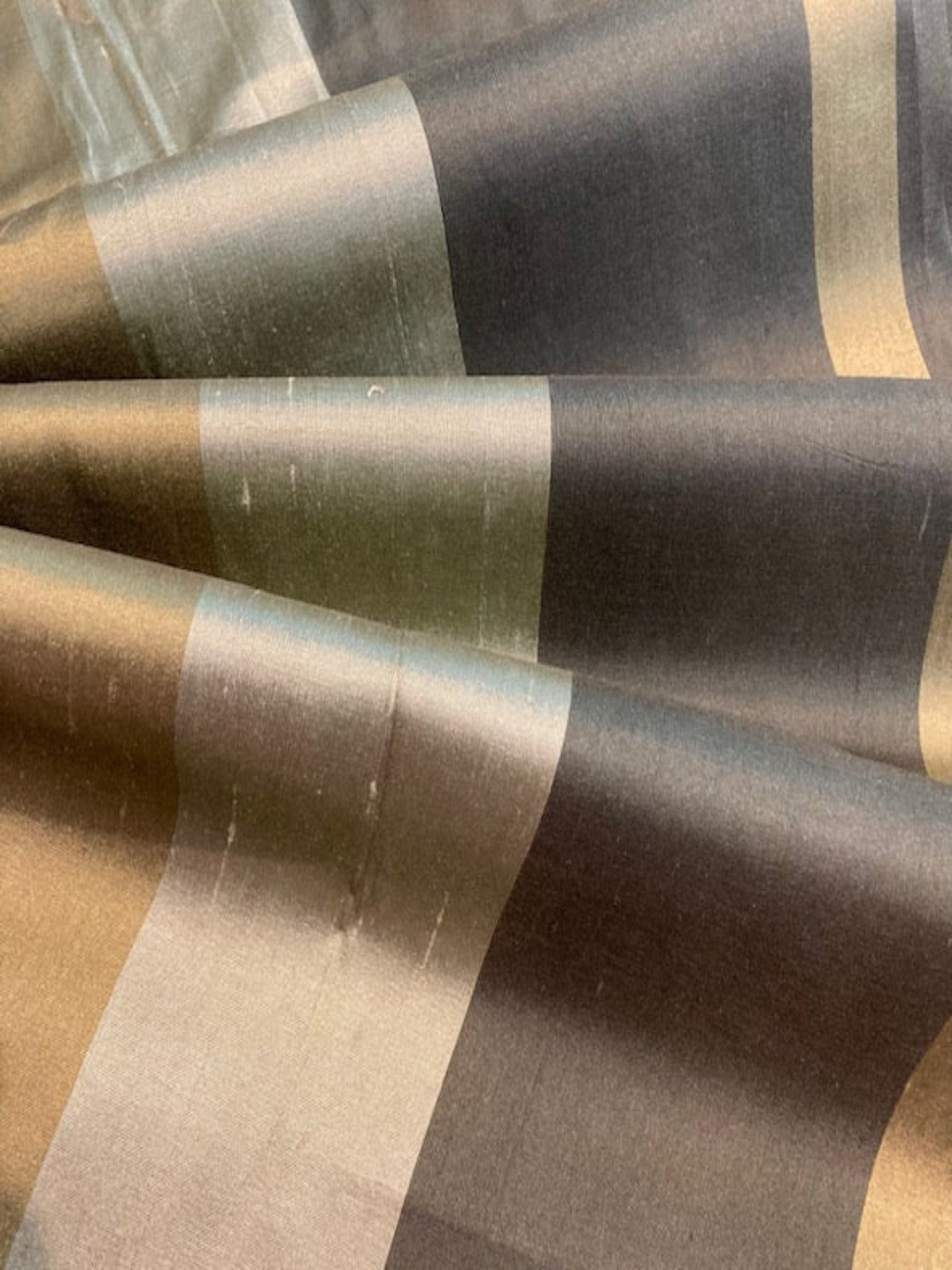 Tones of Green Stripe on Silk Dupion. Stripes Run Across the fabric