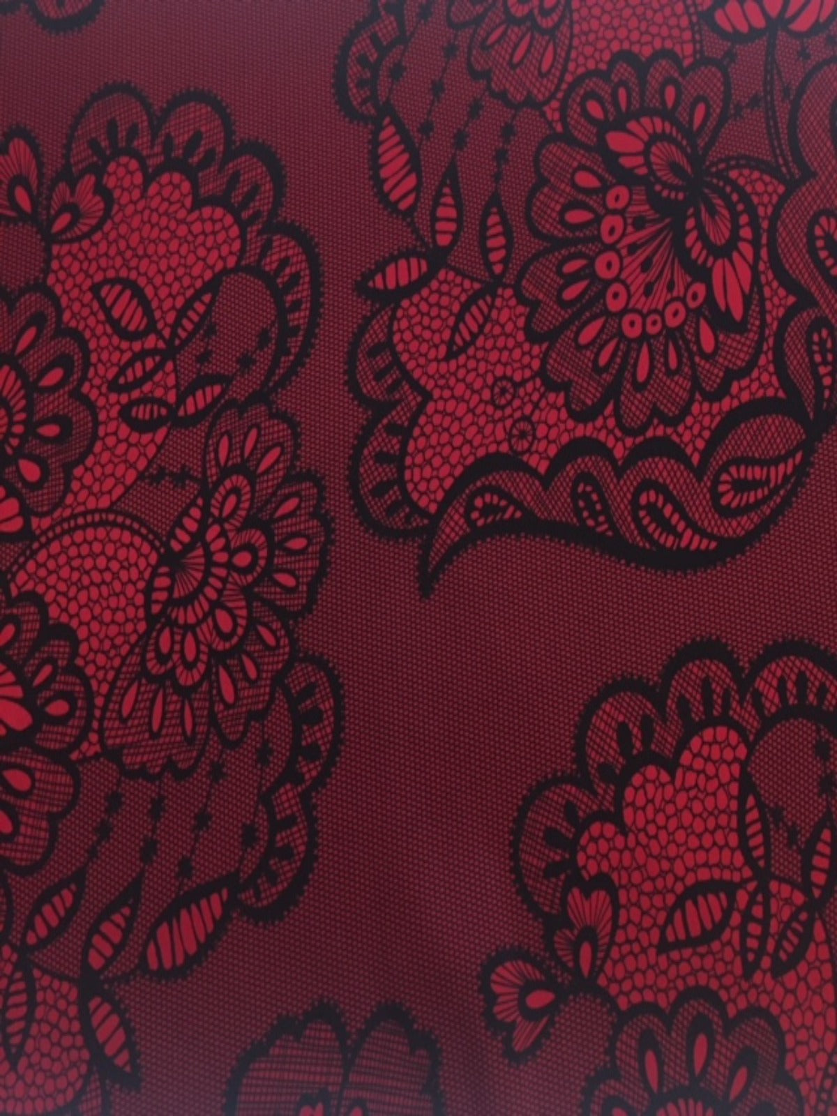 Red / Black Lace Look Print on stretch woven - Deadstock fabric on AmoThreads