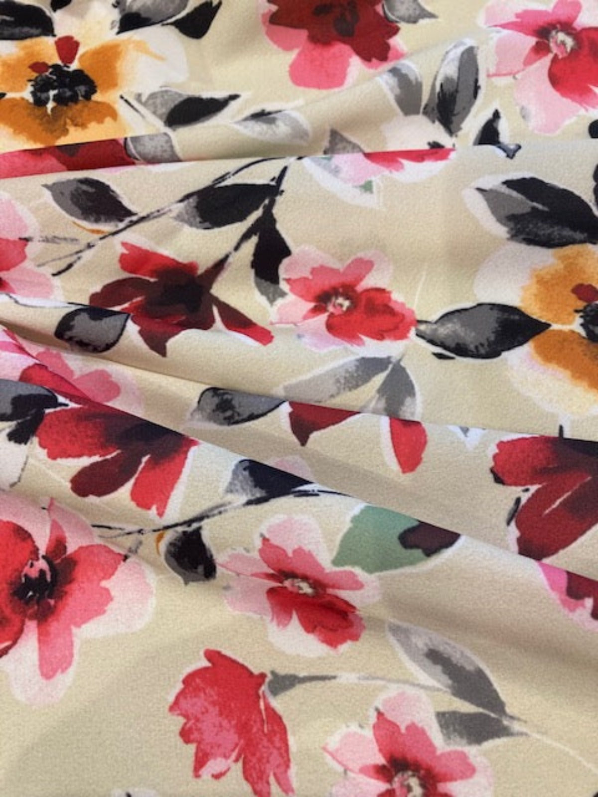 Orange/Pink Flowers on Cream Crepe