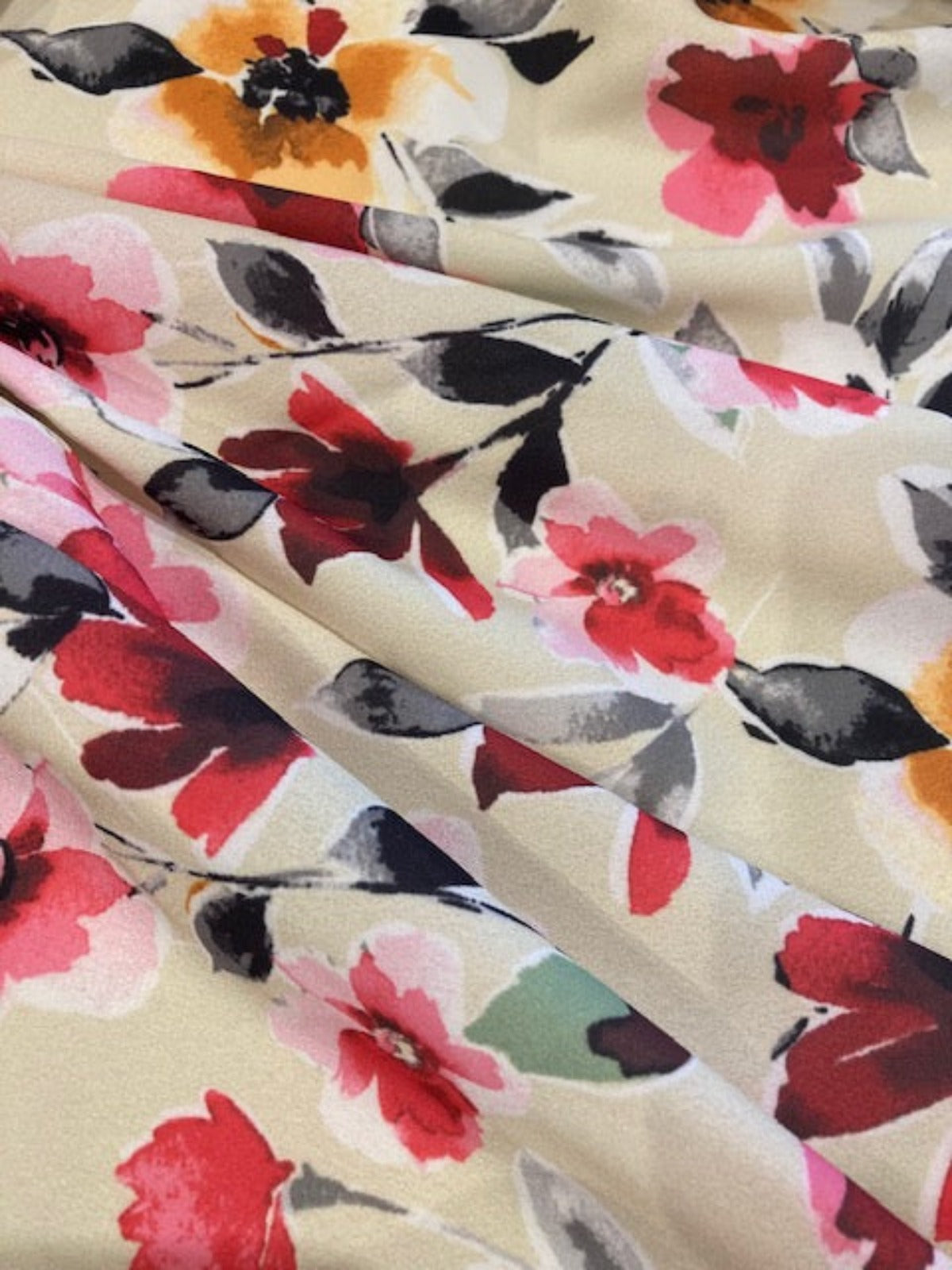 Orange/Pink Flowers on Cream Crepe