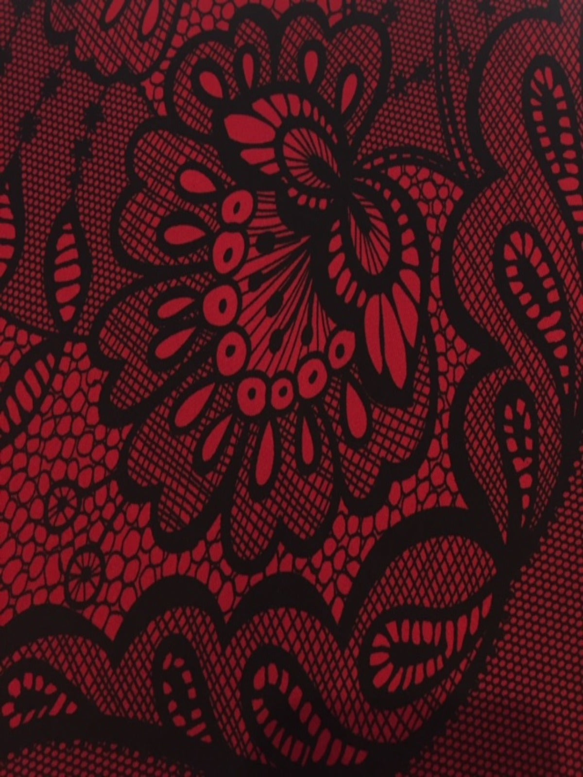 Red / Black Lace Look Print on stretch woven - Deadstock fabric on AmoThreads