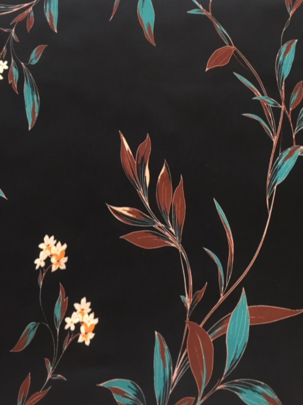Pale Gold Trailing Flowers on Black Woven Crepe - Deadstock fabric on AmoThreads