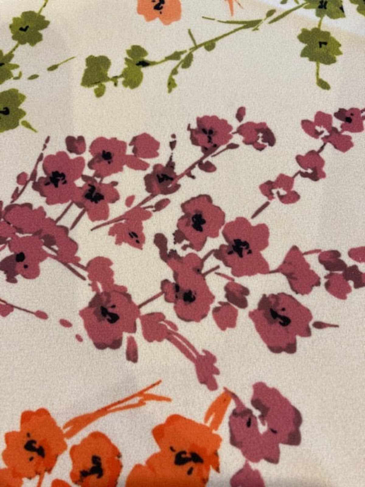 Multi-Coloured Sprigs of Flowers on Nude Crepe Fabric