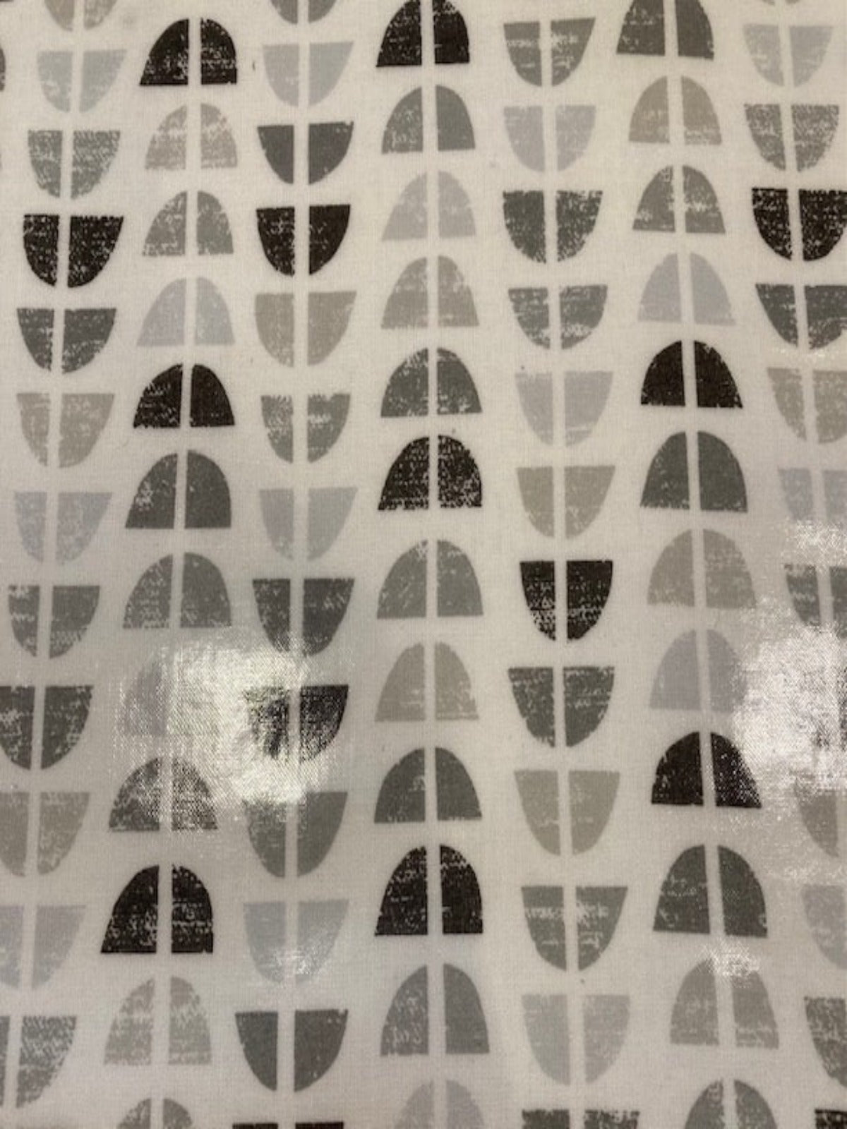 Grey Circular Quarters on White PVC Coated Cotton