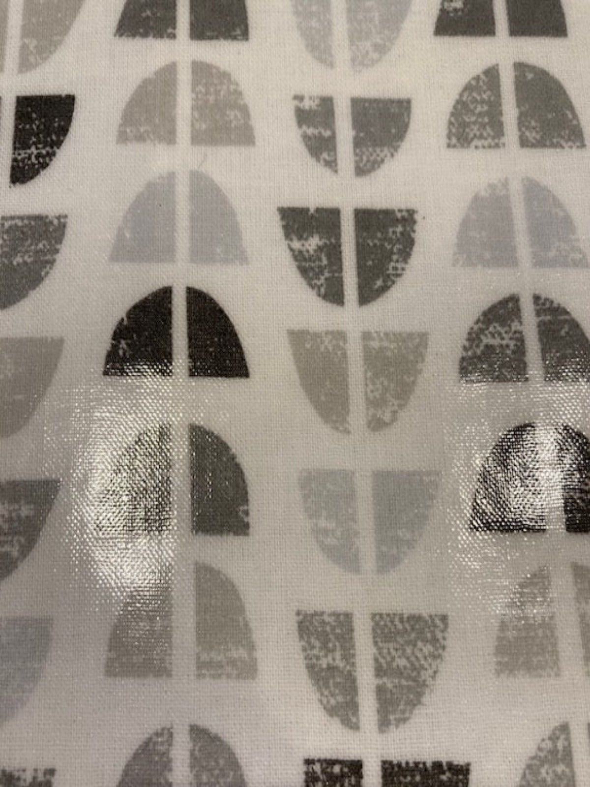 Grey Circular Quarters on White PVC Coated Cotton