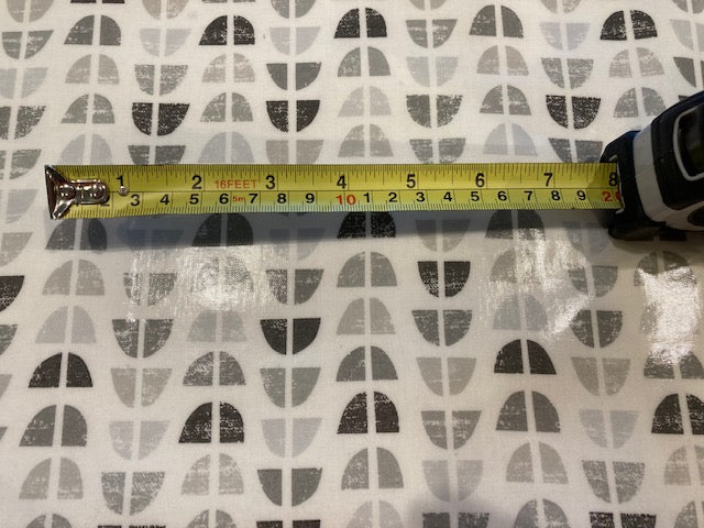 Grey Circular Quarters on White PVC Coated Cotton