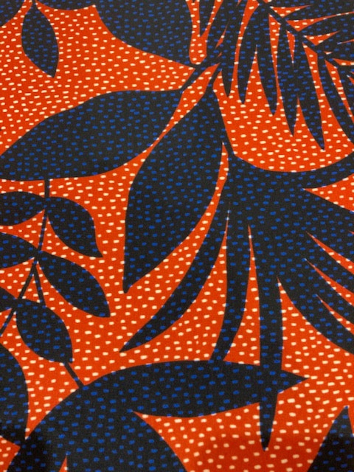 Navy Leaf Print on Red Spotted Background on Smooth Handle Crepe