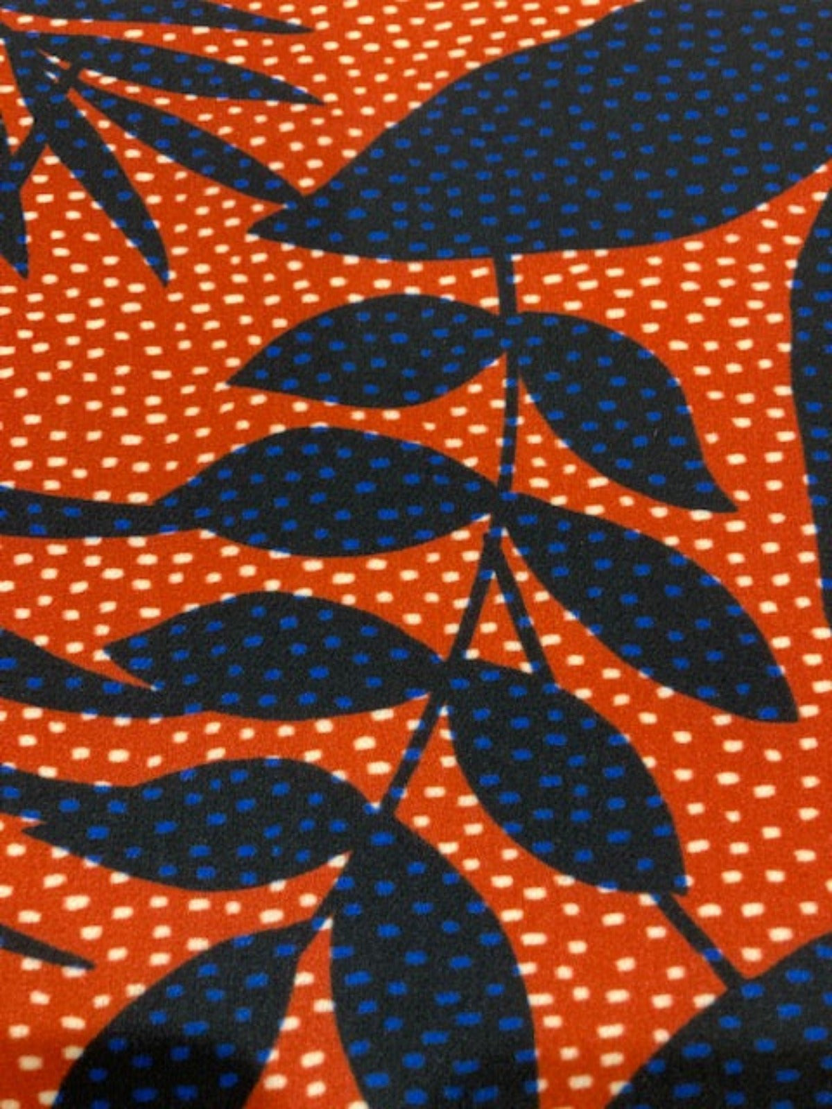 Navy Leaf Print on Red Spotted Background on Smooth Handle Crepe