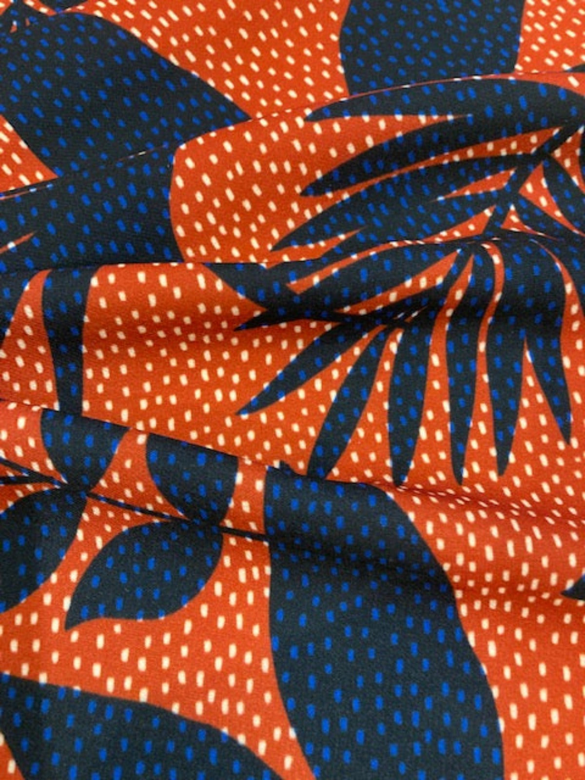 Navy Leaf Print on Red Spotted Background on Smooth Handle Crepe