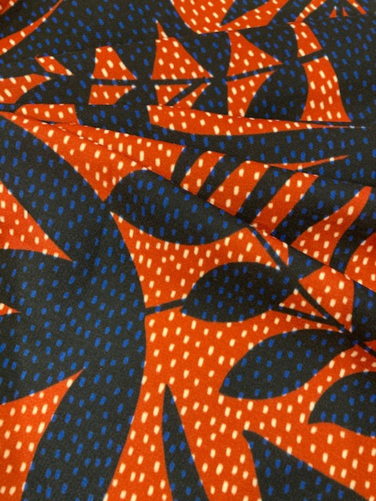 Navy Leaf Print on Red Spotted Background on Smooth Handle Crepe