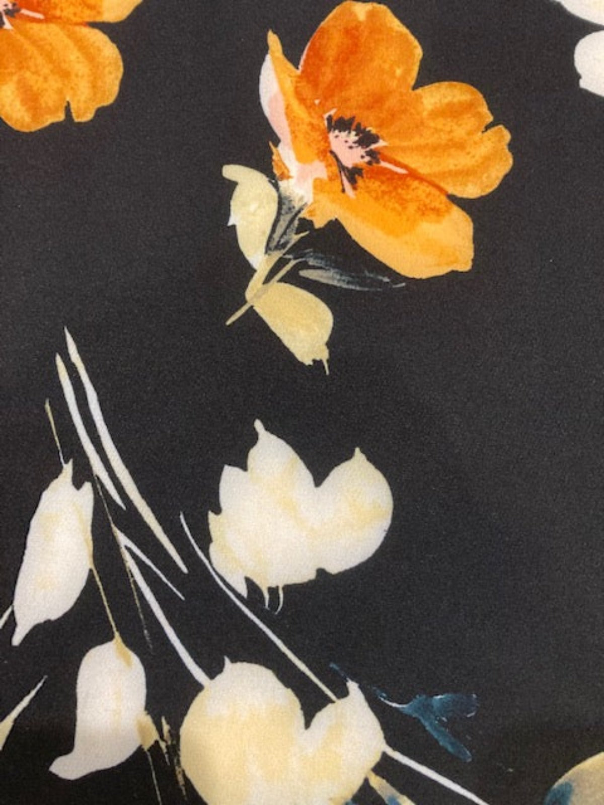 Orange Flowers on Black Woven Crepe With Stretch
