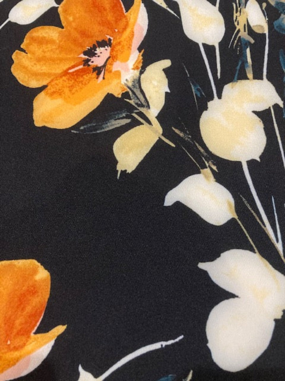 Orange Flowers on Black Woven Crepe With Stretch