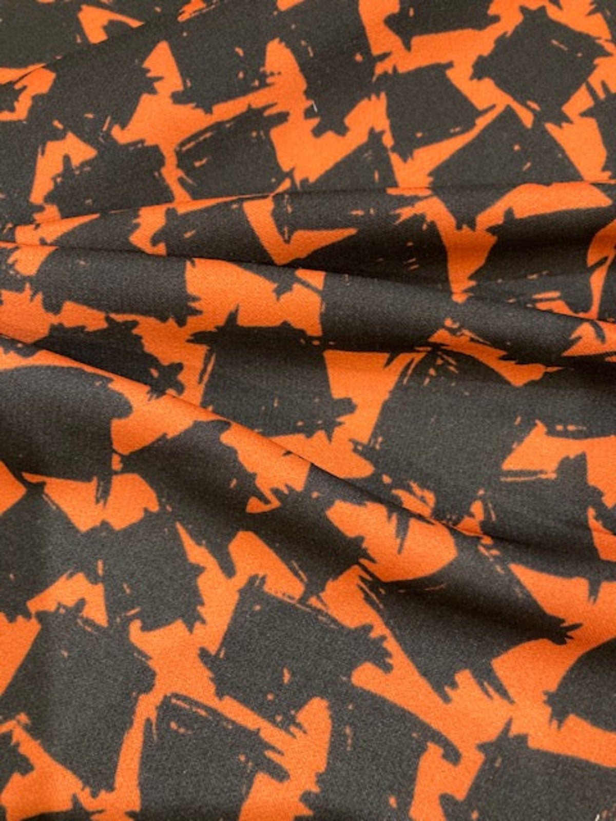 Black Abstract Blocks on Orange – Dress Weight 100% Polyester, 145 cm Wide