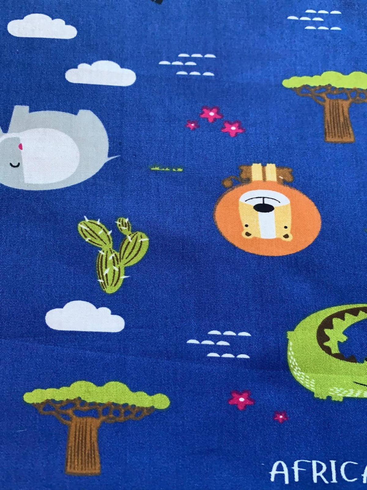 African Animal print on Royal Blue Cotton Sateen - Deadstock fabric on AmoThreads