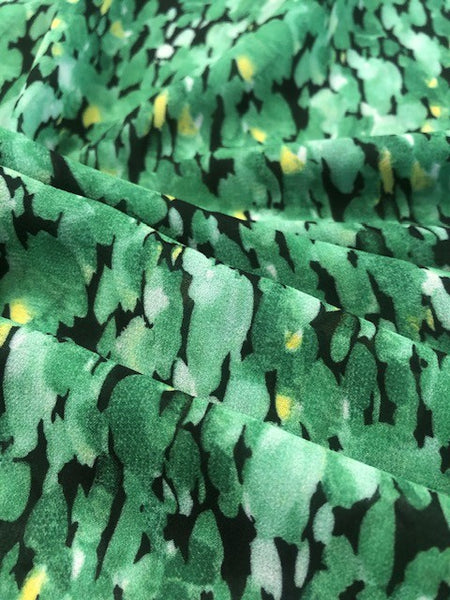 Green Abstract Flowers on Black – Lightweight Dressmaking Fabric