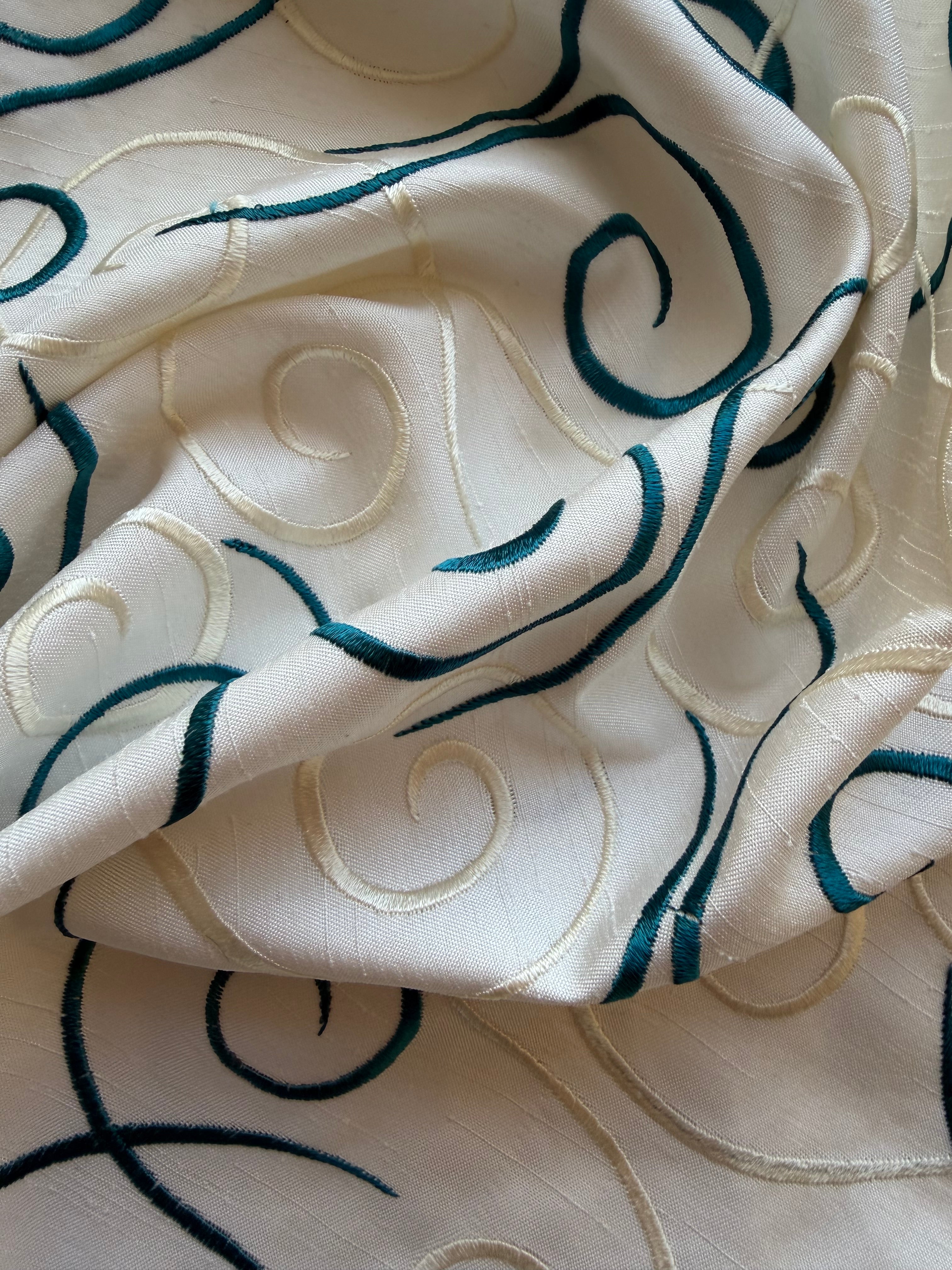 Austrian Embroidered Satin-Backed Dupion Fabric – Ivory with Teal & Champagne Swirls | 112 cm Wide