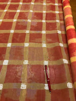 Orange Tones Check Print on Organza. 60g/m2, 100% Polyester. Roll Size - 5.5m