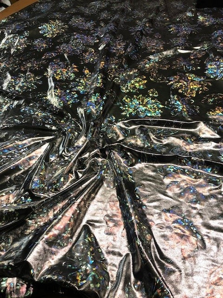 Silver Iridescent Foil Print on Knit. 140g/m2, 95% Polyester 5% Elastane. Roll Size - 1.6m