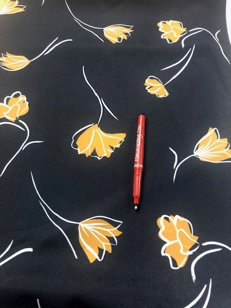 Gold Tulip on Navy Soft Touch. 110g/m2, 100% Polyester. Roll Size - 7.5m.