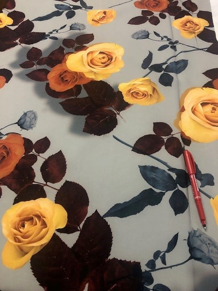 Gold/Orange Roses on Grey/Green Scuba Crepe. 220g/m2, 95% Polyester 5% Elastane. Roll Size - 3m