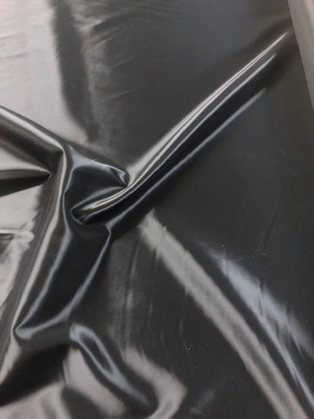 Black Acetate Stretch Lining. 80g/m2, 48% Polyester 48% Acetate 4% Spandex. Roll Size - 4m