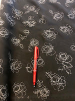 Rose Monocolour on Black Crepe De Chine. 90g/m2, 100% Polyester. Roll Size: 3.2m