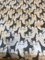 Mono Giraffe on White Cotton. 100g/m2, 100% Cotton. Roll Size: 2.3m