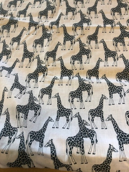 Mono Giraffe on White Cotton. 100g/m2, 100% Cotton. Roll Size: 2.3m