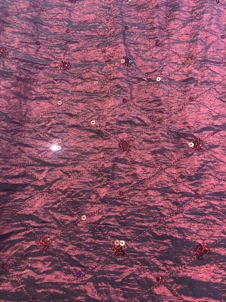 Burgundy Irridescent Crushed with Diamond Embroider and Sequins. 140g/m2, 100% Polyester. Roll Size: 3.4m