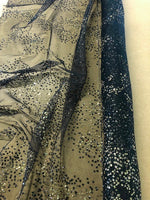 Gold Glitter on Black Tulle. 80g/m2, 100% Nylon. Roll Size: 3m
